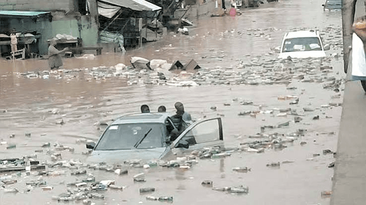 Flooded road with cars turning back